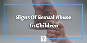 Child holding adult's finger