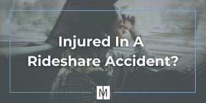woman distressed in the back seat of a rideshare