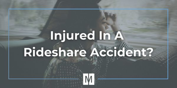 woman distressed in the back seat of a rideshare