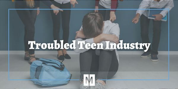 Troubled Teen Industry|Woman looking out at sunset